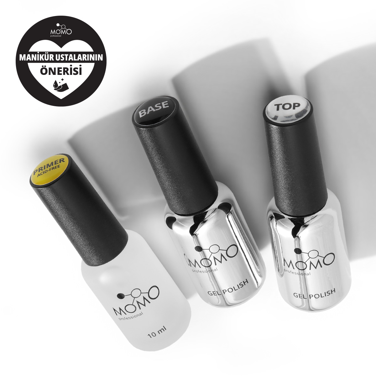Momoprof Primer (9 ml), Base Coat (10 ml) ve Top Coat (10 ml) 3’lü Set Momoprof Primer (9 ml), Base Coat (10 ml) ve Top Coat (10 ml) 3’lü Set